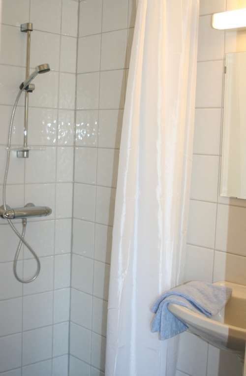 Flislagt dusjbad med varmekabler